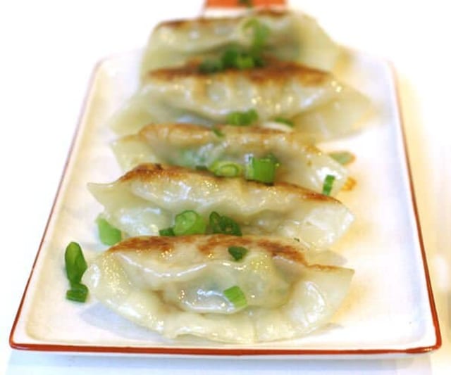 105. Fried Dumplings (6 Pieces).